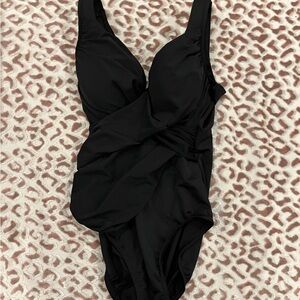 Black MiracleSuit women’s bathing suit. Major tummy control.